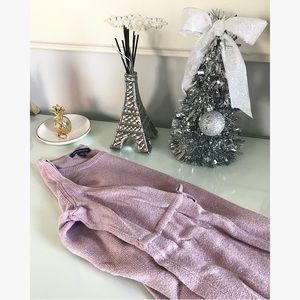 Cold shoulder and bell sleeve sweater.